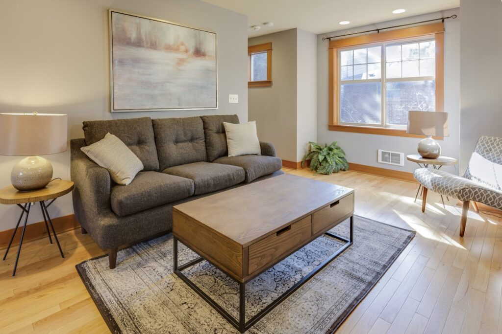 Warm living room with soft natural light, representing the supportive family presence during in-home detox